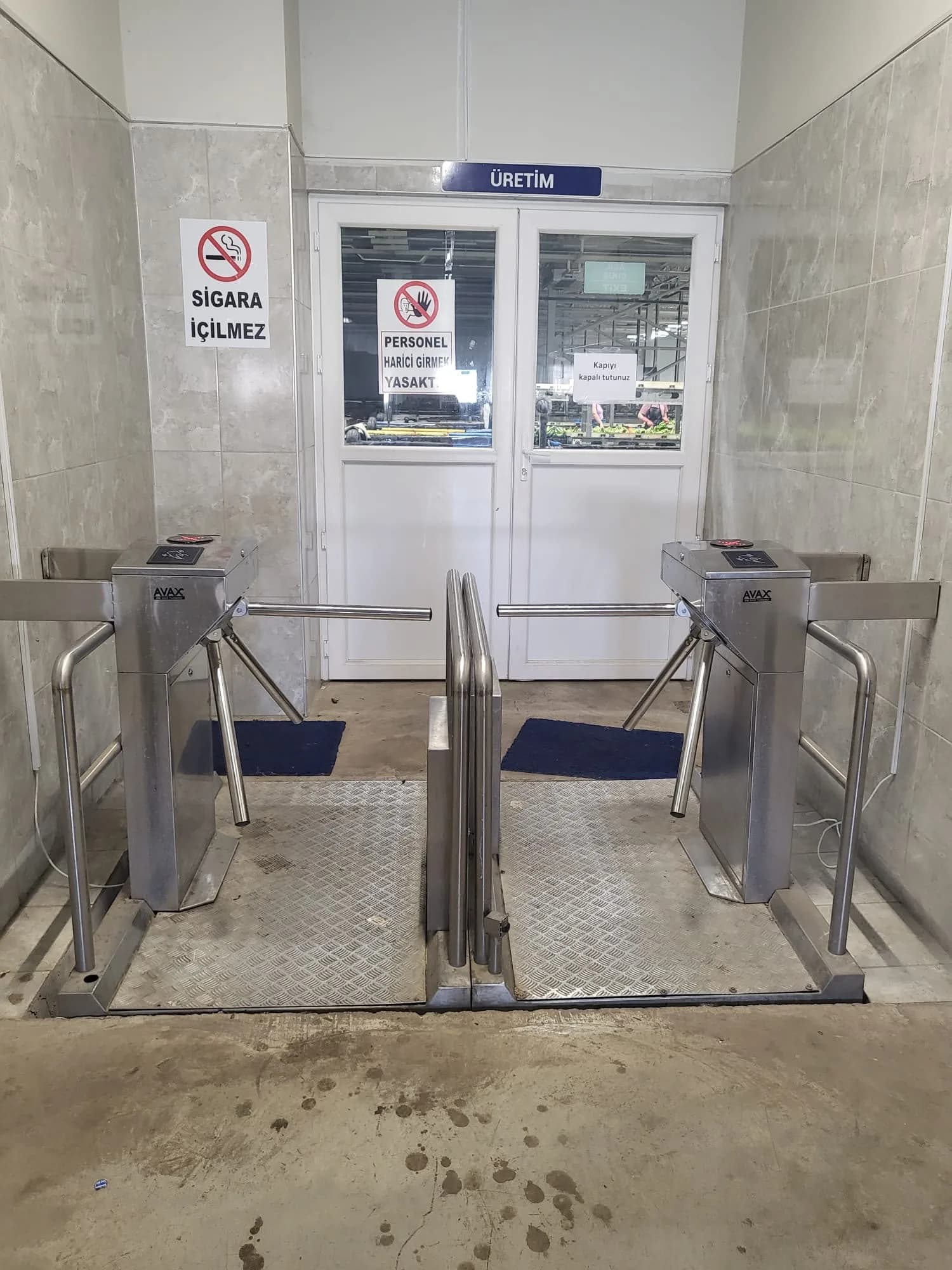Personnel turnstile at the production entrance